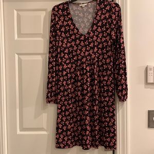 Boden dress gathers at the waist but not tight black background soft material.